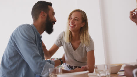 happy couple posing for a picture at home