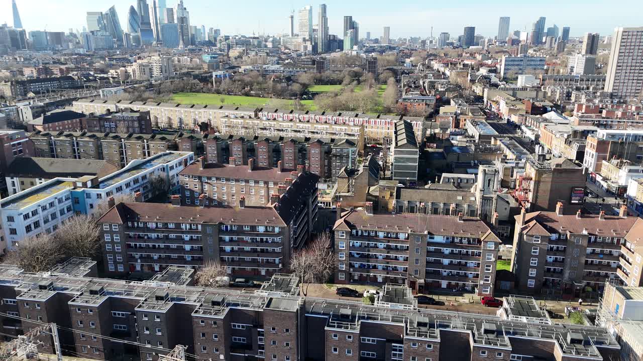 Council housing Bethnal Green East London Pan up drone reveal city skyline