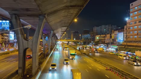 vehicles moving on a busy highway at night