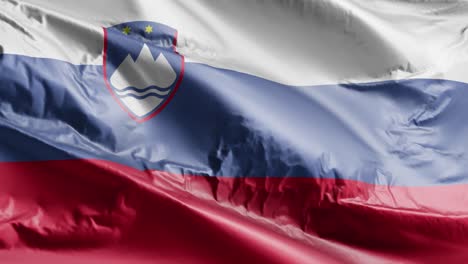 slovenia flag waving on the wind loop. slovenian banner swaying on the breeze. full filling background. 10 seconds loop.