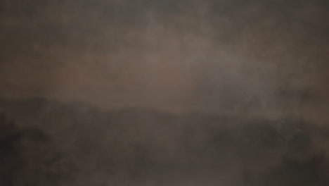 fire ball with smoke moving against grey background