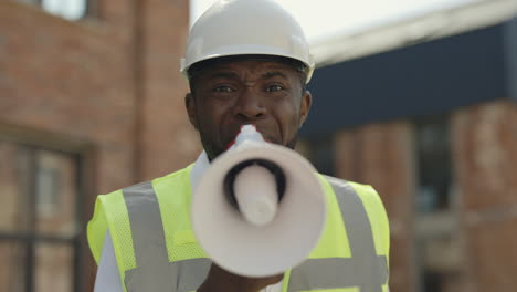 construction worker using megaphone