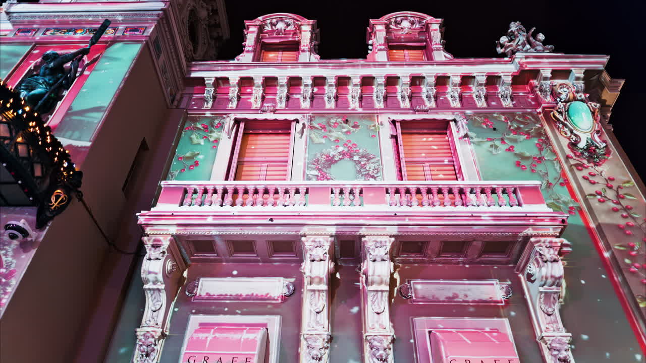 Monte Carlo, Monaco - December 14, 2024: Front view of the Monte Carlo Casino decorated for Christmas in the evening