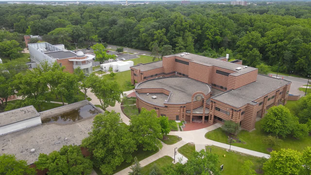 Aerial view of Social Sciences building in campus grounds of Michigan University