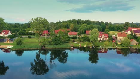 aerial view of a row of houses by the lake