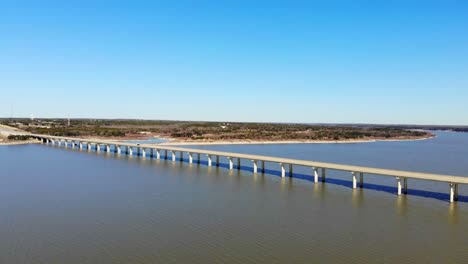 Pulling-away-from-the-large-4-lane-bridge-crossing-the-lake