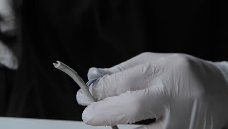 slicing a electric wire with precision pliers closeup