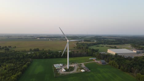 aerial footage of lonely windmill renovable energy source, sustainable living