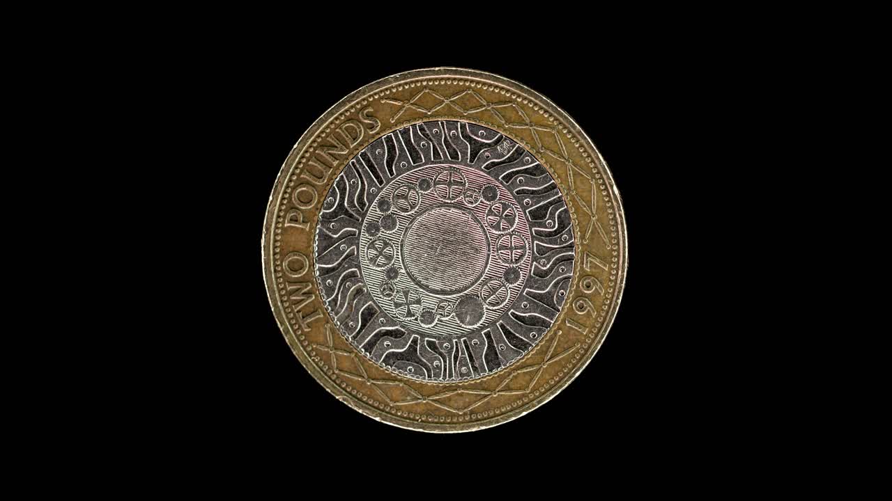United Kingdom 2 pound 1997 reverse with four concentric circles, macro loop on black background
