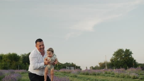 Happy-father-playing-with-his-little-daughter