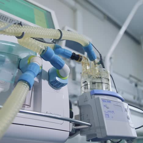 medical ventilator machine in hospital. apparatus of artificial lung ventilation near bed