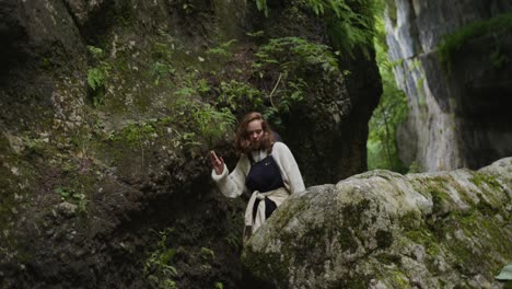 woman hiking in a mountain canyon