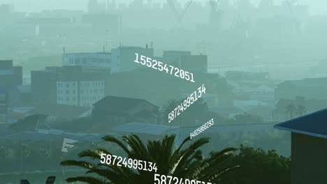 animación de números cambiantes y procesamiento de datos frente a una vista aérea del paisaje urbano