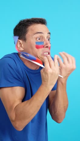 Man cheering for Haiti, angry with the decision of referee