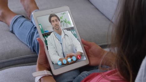 Woman-talking-on-video-meeting-on-her-digital-tablet