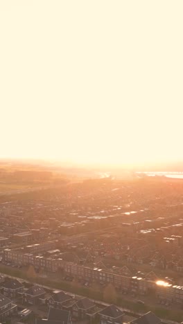 sunset over dutch residential area