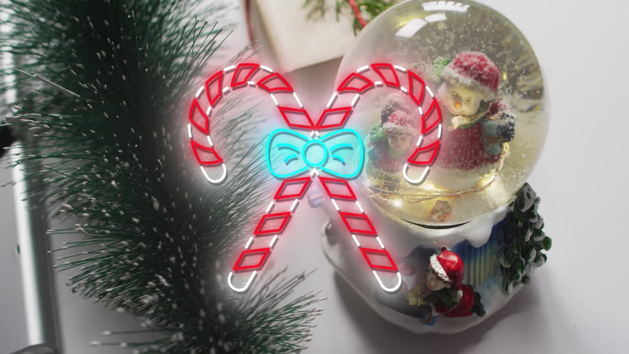 Animation of neon candy canes over christmas decorations