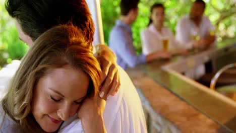couple dancing together in restaurant