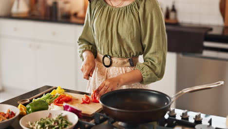 woman cooking in kitchen