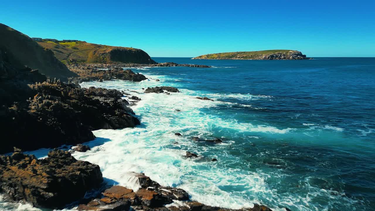Aerial view of seascape along the vast beach on the South Coast during summer