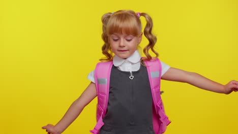 Funny-school-pupil-girl-listening-music,-dancing-to-disco-music-rhythmically-moving,-having-fun