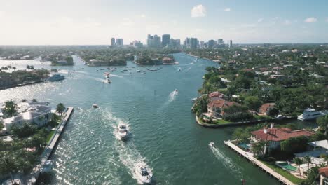 boats passing through new river in fort lauderdale, florida, usa