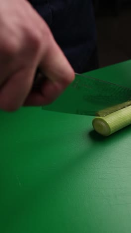 chef chopping a leek