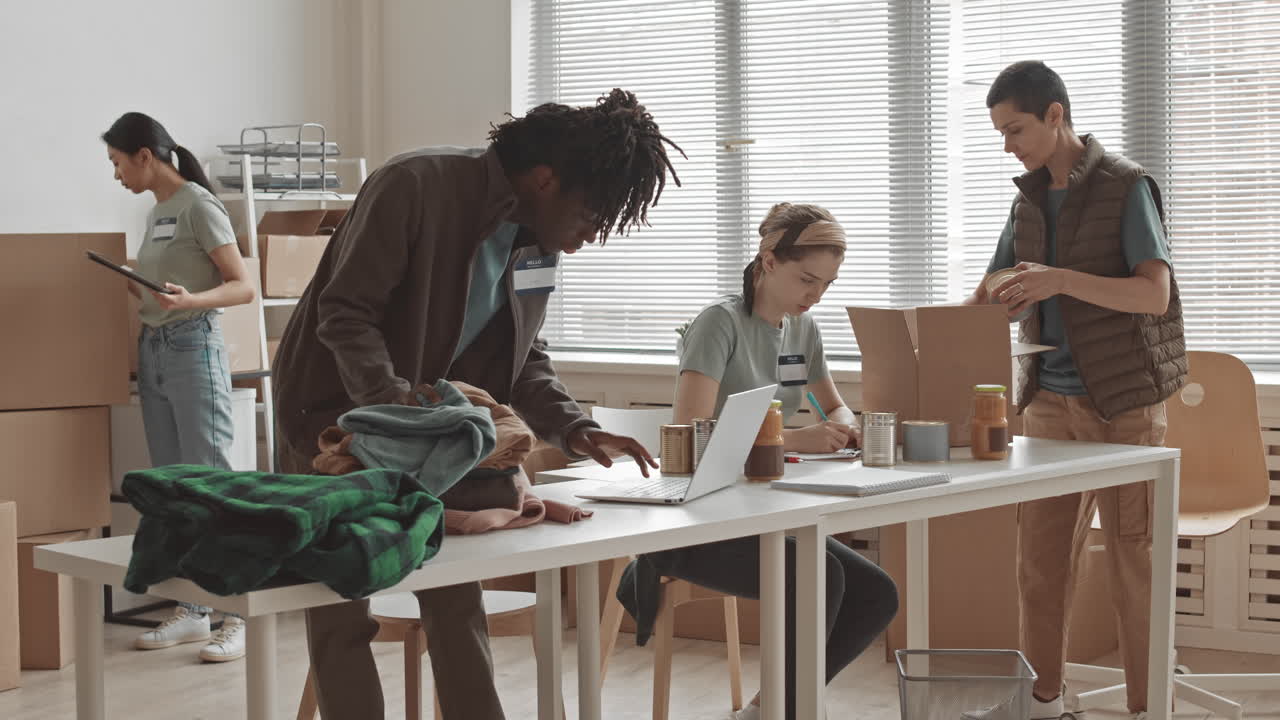 Volunteers sorting donations