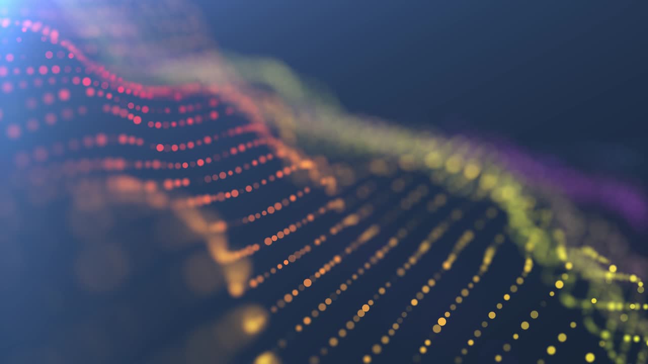 Beautiful abstraction of neon circles swirling and changing their color on a black background.