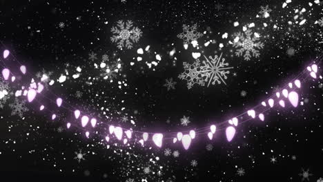 animation of glowing strings of fairy lights and glittering shooting star and snowflakes