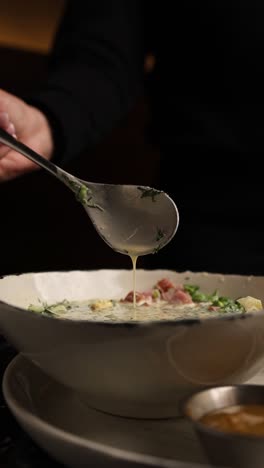 woman eating okroshka soup