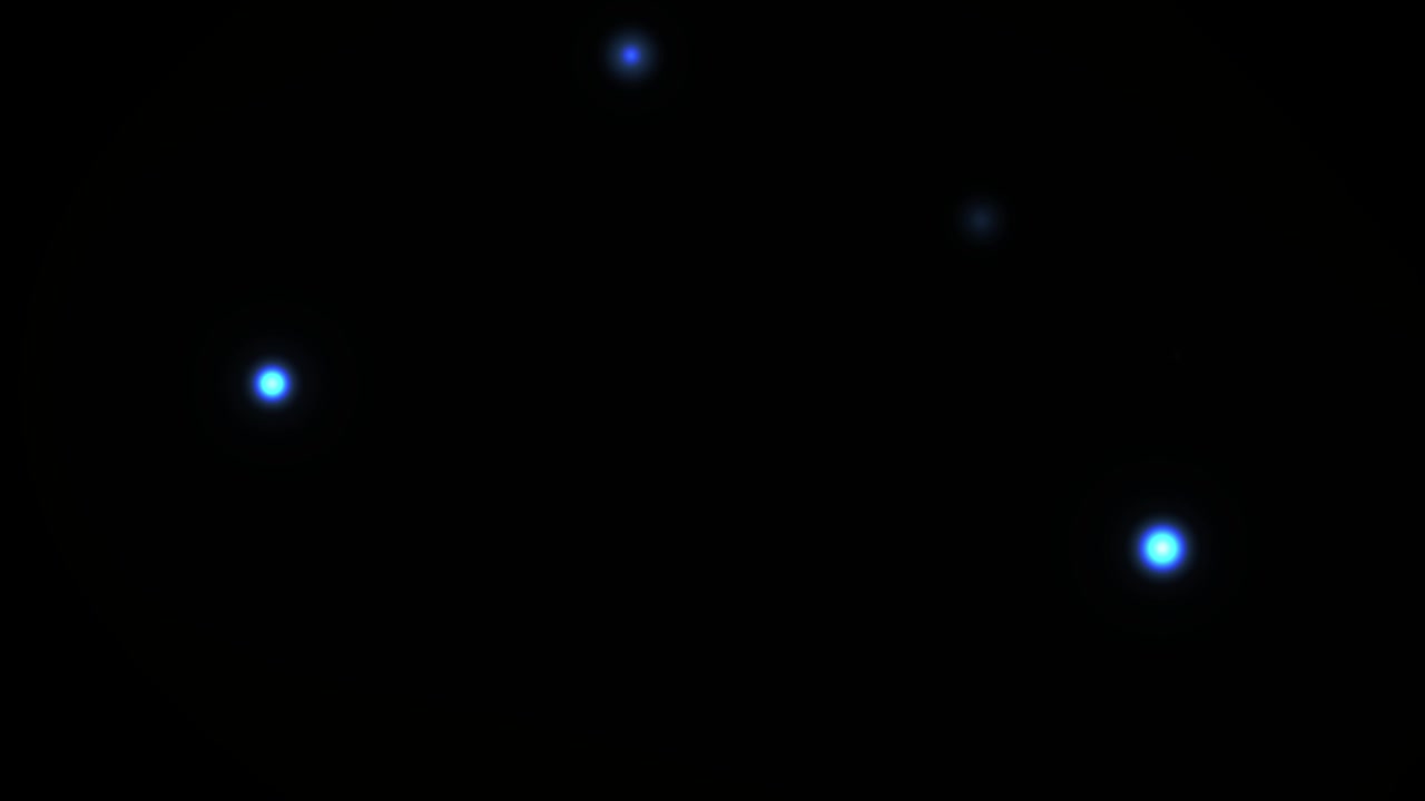 Ethereal Blue Light Particles Floating in Darkness