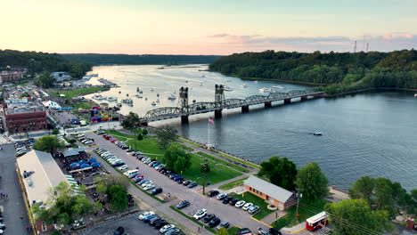 Sunset-aerial-of-iconic-Stillwater-Lift-Bridge,-Lumberjack-Days-summer-festival