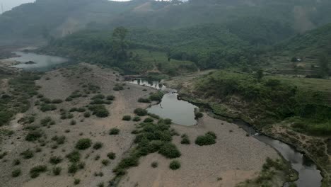 aerial view of a dammed river and surrounding landscape