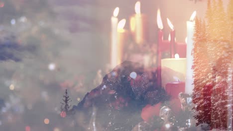 animación del paisaje de invierno sobre las velas de navidad