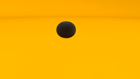 black metaball on orange. minimalistic cover footage. pop and dance mood digital technology. 4k