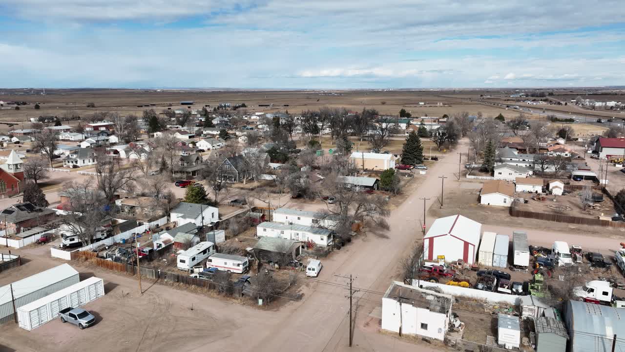 Pierce Colorado drone rising to reveal view of town. Winter 2026
