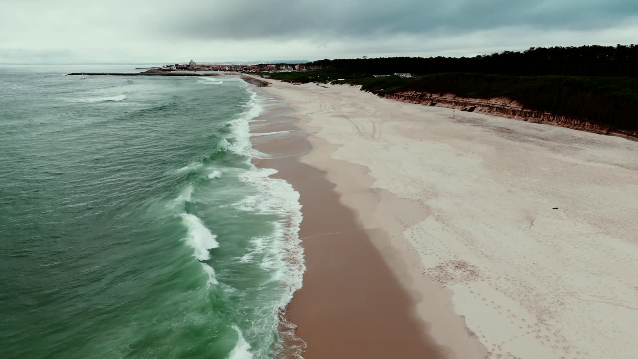 Aerial wide shot of São Pedro da Maceda beach coastline in Ovar Portugal