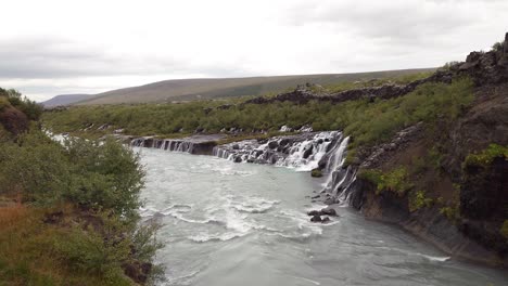 hraunfossar waterfall in western iceland, europe - profile view