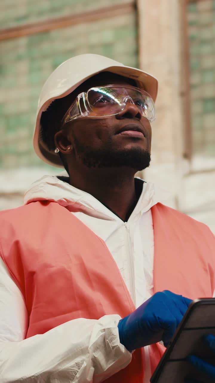 Worker Inspecting in Industrial Setting