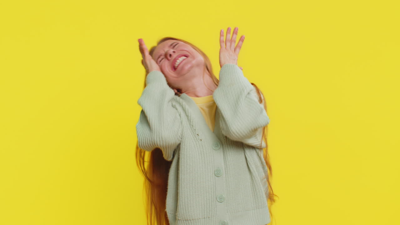 Irritated angry young woman screams from stress tension problem feels horror hopelessness shock rage
