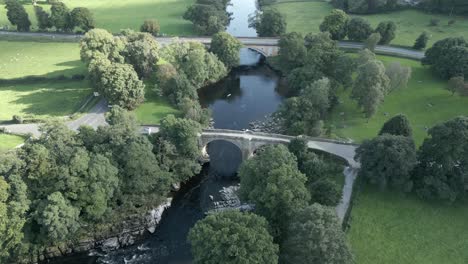 an aerial view of the devil's bridge at kirkby lonsdale on a summer evening, yorkshire, england, uk