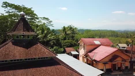 small mosque in agricultural village windusari on java, indonesia, aerial view