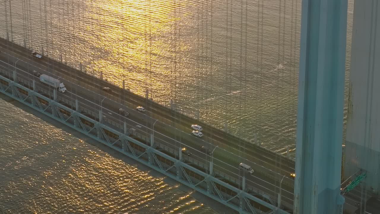 Bridge with cars on a body of water