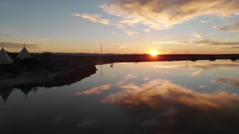 el paso, tx. puesta de sol, antena de drones sobre el agua