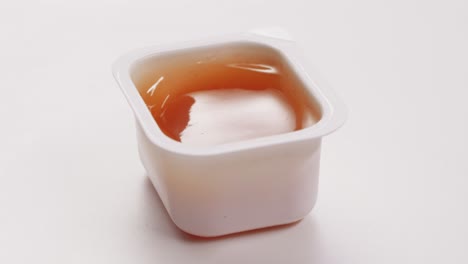 single-serving plastic sauce container