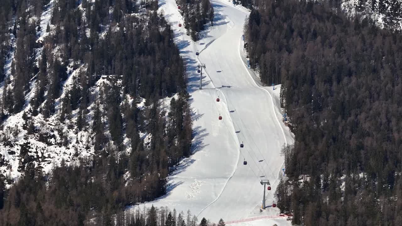 Aerial view of a gondola in Cortina d'Ampezzo, home to the Olympics. Mountains and snow of a ski resort