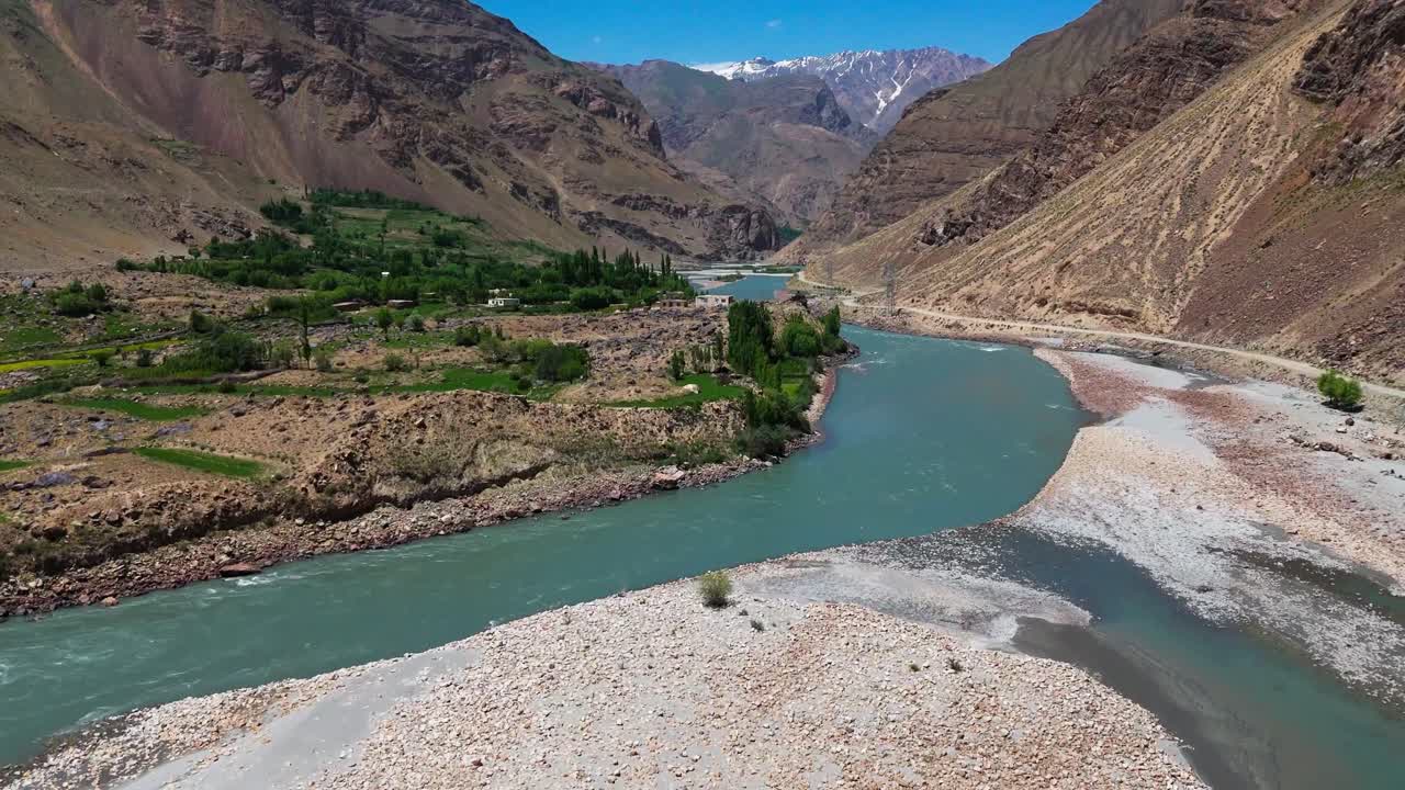 drone aerial view of Pamir mountains Central Asia drone above border between Tajikistan and Afghanistan