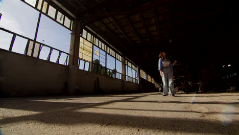 woman in an abandoned factory