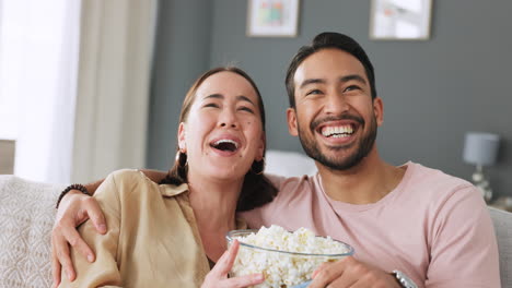 Happy-couple,-tv-remote-and-popcorn-while-watching